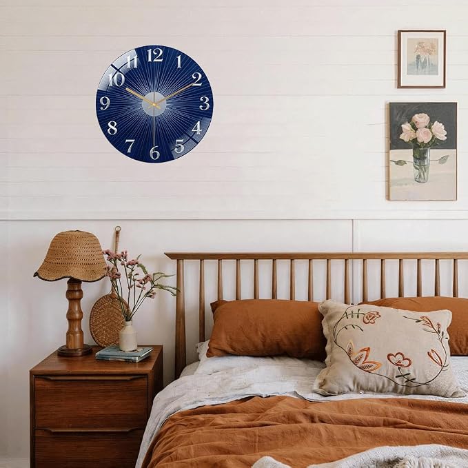 12 Inch Navy Sunburst Glass Wall Clock Silent Modern Art Decor | Silent glossy clock with deep blue sunburst and silver numbers, elegantly tracking time for your modern living room