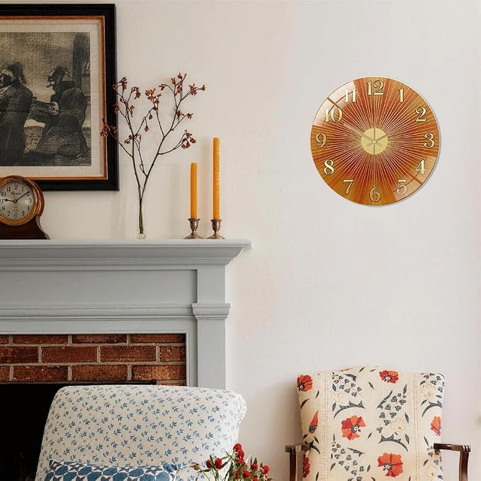24 Inch Orange Sunburst Glass Wall Clock Silent Art Decor | Silent glossy clock with warm orange sunburst and gold numbers, accurately tracking time for your retro living room