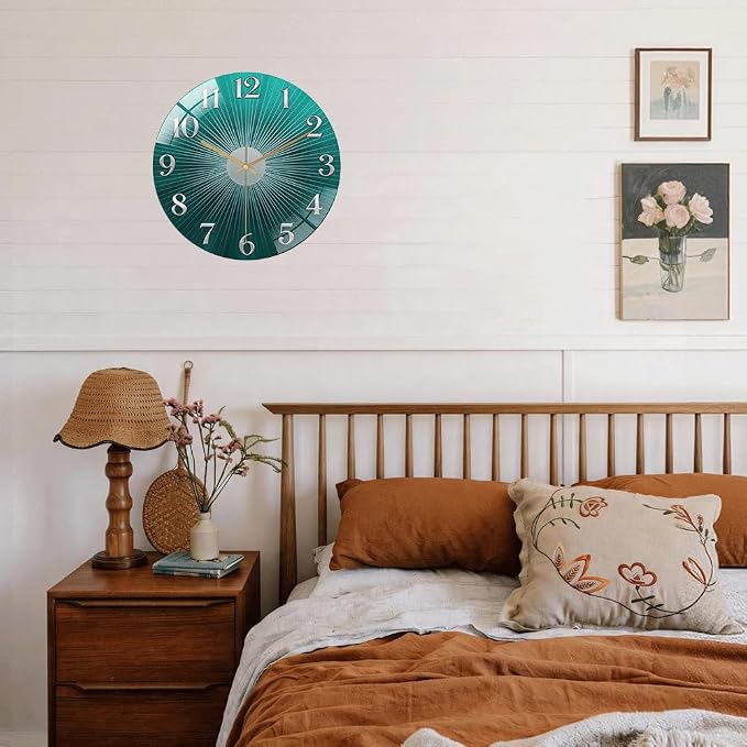 12 Inch Teal Sunburst Glass Wall Clock Silent Modern Art Decor | Silent glossy clock with an elegant teal sunburst and silver numbers, perfectly tracking time for your modern living room