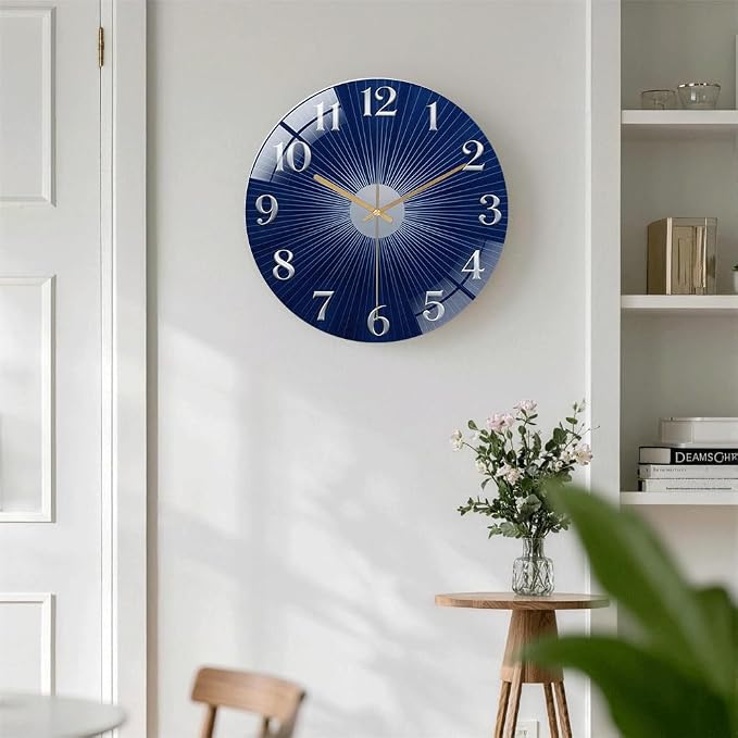 12 Inch Navy Sunburst Glass Wall Clock Silent Modern Art Decor | Silent glossy clock with deep blue sunburst and silver numbers, elegantly tracking time for your modern living room