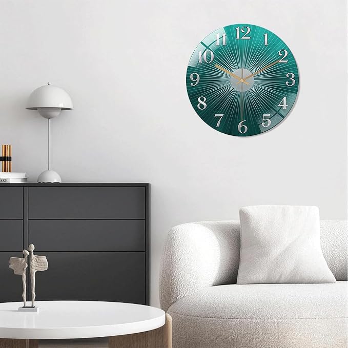 16 Inch Teal Sunburst Glass Wall Clock Silent Modern Art Decor | Silent glossy clock with an elegant teal sunburst and silver numbers, perfectly tracking time for your modern living room