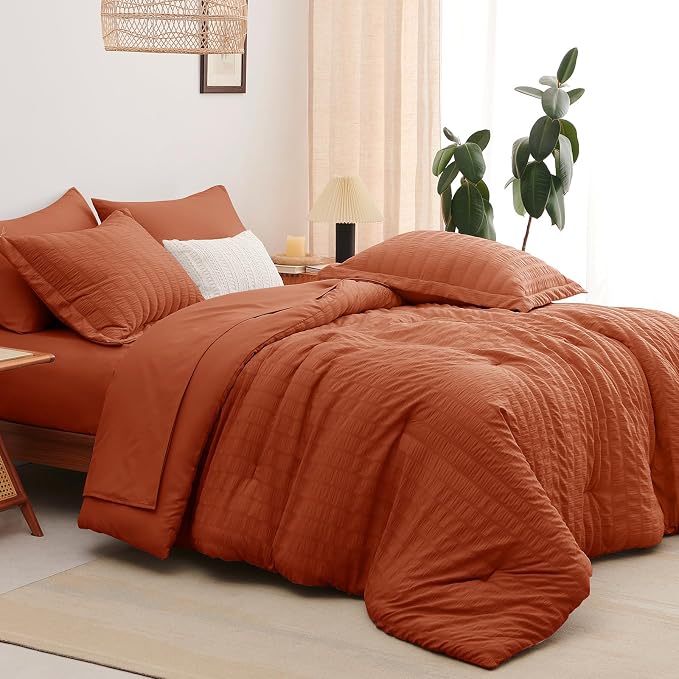 CozyLux Oversized King Comforter Set with Sheets, 7 Pieces 120"x98" Burnt Orange Seersucker Bed in a Bag, Terracotta Bedding Set with Down Alternative Comforter, Sheets, Pillowcases & Shams, Home Gift