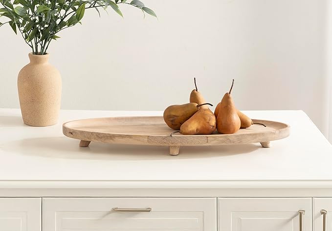 Kate and Laurel Tomaz Modern Decorative Mango Wood Oval Footed Tray, 23 x 7, Light Natural, Transitional Food-Safe Wooden Coffee Table Tray with Elevated Design and Unique Oval Shape