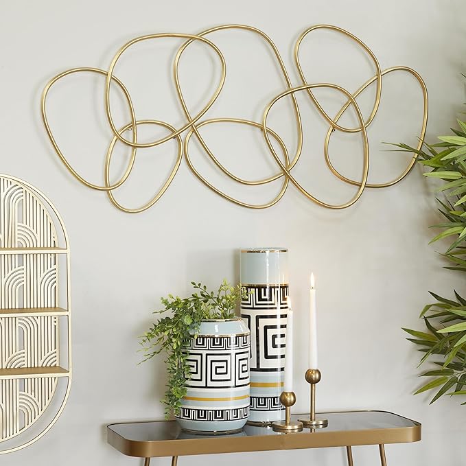 CosmoLiving by Cosmopolitan Metal Abstract Home Wall Decor Interlocking Rings Wall Sculpture, Wall Art 43" x 1" x 22", Gold