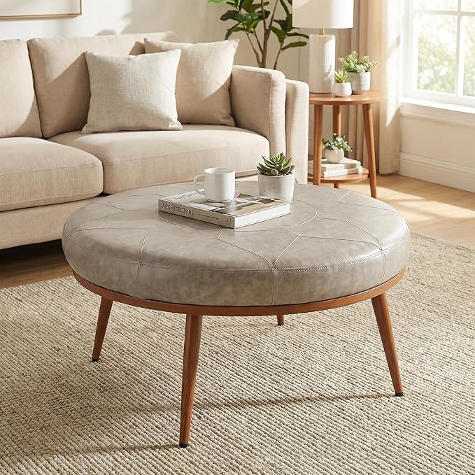 Elegant Round Ottoman Coffee Table - PU Leather Fabric, Metal Frame, Thick Cushioned Tabletop for Living Room, Therapy Room, or Style Lovers - Perfect as Coffee Table, Footstool, or Chair-Grey