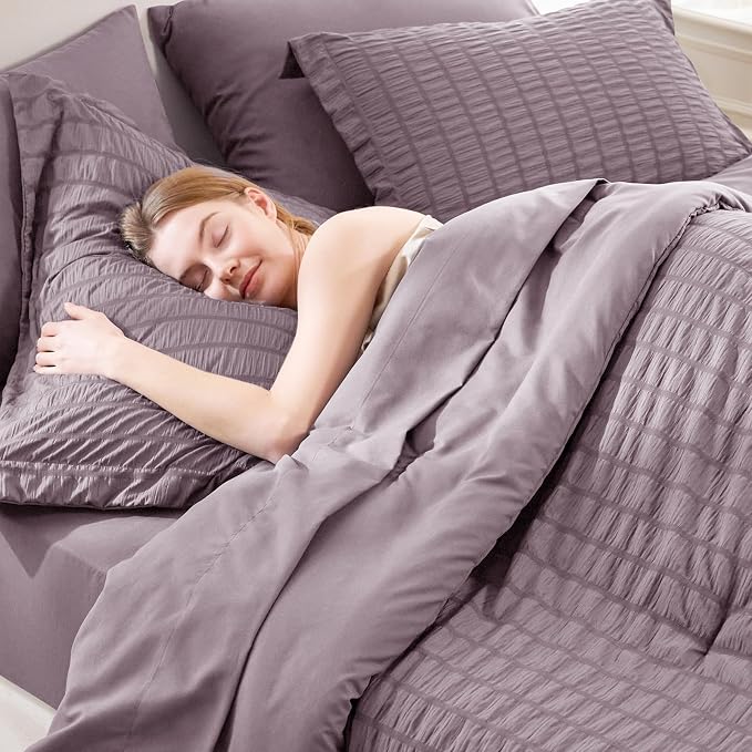 CozyLux Oversized King Comforter Set with Sheets, 7 Pieces 120"x98" Dusty Purple Seersucker Bed in a Bag, Grayish Purple Bedding Sets Gift with Down Alternative Comforter, Sheets, Pillowcases & Shams