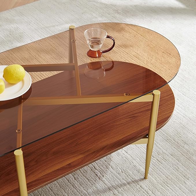Oval Glass Coffee Table, Mid-Century Modern Design, L42*W22*H17 inch, for Living Room, Amber Glass Top and Walnut Finish Wood Shelf, Conical Metal Legs with Gold Finish